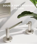 Pivoting Toilet Paper Holder With Double Post Mount In Brushed Nickel and Satin Nickel Finish shown on white wall.