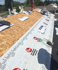 Workers installing Heavy Duty Synthetic Roof Underlayment Roll 48 Inches Wide delivering 1000 Sq Ft coverage for roofing.