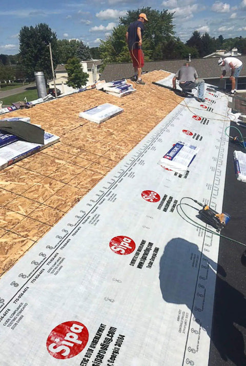Workers installing Heavy Duty Synthetic Roof Underlayment Roll 48 Inches Wide delivering 1000 Sq Ft coverage for roofing.