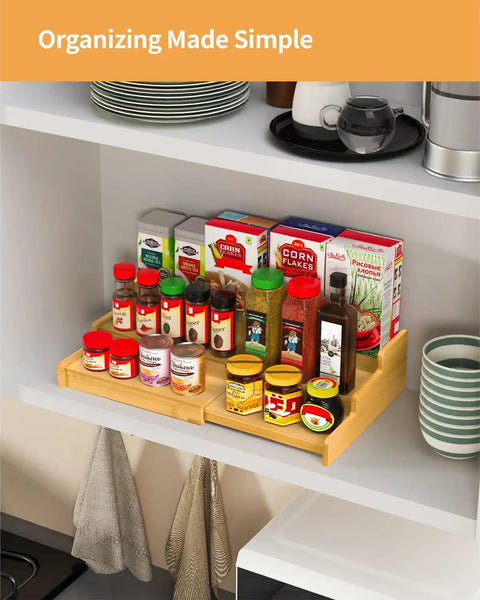Premium Grade Three Tier Natural Bamboo Spice Rack With Adjustable Cabinet Organizer Shelf For No Sweat Kitchen Countertop Storage displaying spices.