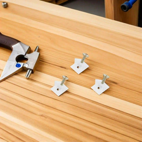 Three Space Saver 50 Pcs Drawer Support Wedges with screws on wooden surface, showing 45 degree angle metal and plastic brackets.