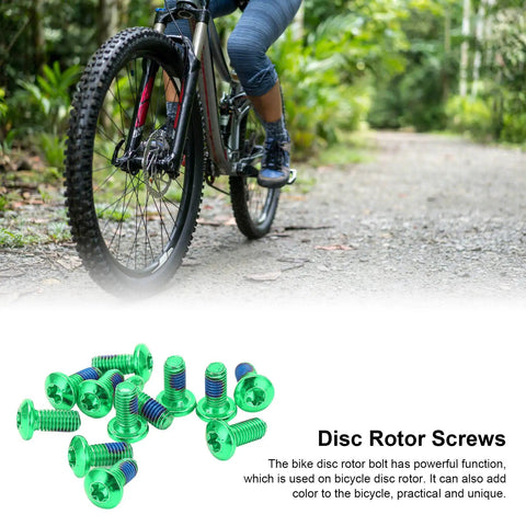 Aluminum Alloy Disc Brake Rotor Bolts 12 Piece Set For Mountain Road And Fixed Gear Bikes Green Screws Lightweight Premium Quality Durable Rotor Retention For Easy Maintenance featuring vibrant green screws with a cyclist in the background