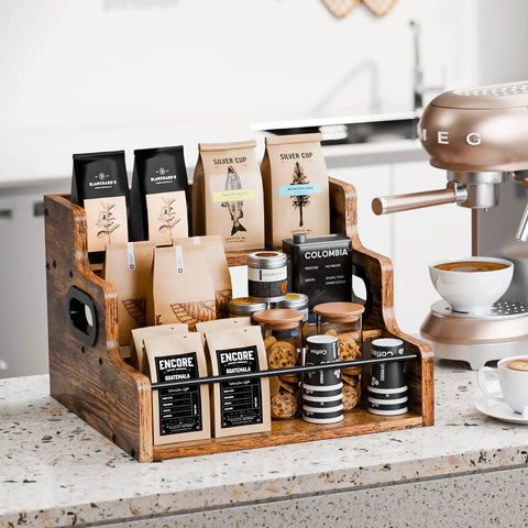 Three Tier Wooden Liquor Display Shelf For Home Bar 3 Step Countertop Rack holds coffee cups and snacks on a kitchen counter.