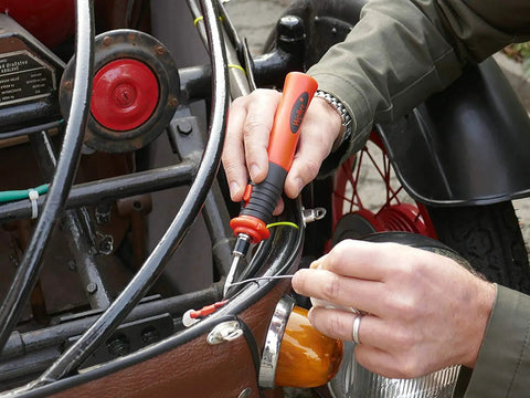 Using Cordless Soldering Iron With Rechargeable Lithium Ion Battery Portable Compact Tool For On The Go Soldering on vehicle wiring