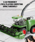 Remote Control One Twenty Four Scale Combine Harvester With Four Wheel Drive And Six Channel System shown with controller