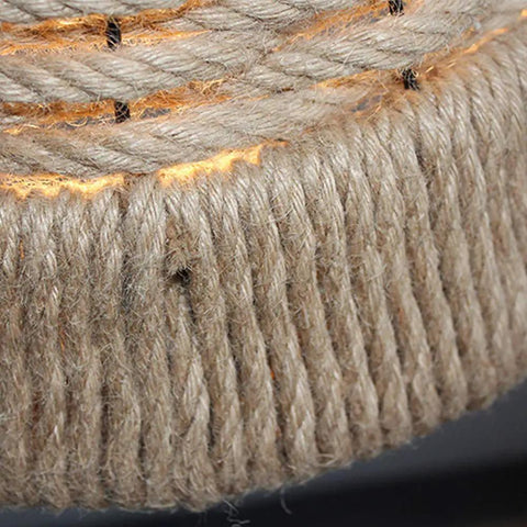 Close-up of Coastal Rope Rattan Handwoven Pendant Lamp In Natural Finish showing intricate rattan weaving detail.