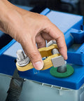 Hand installing Two Pair Battery Terminal Connectors With M8 Bolts 21mm Long, Pure Copper Cable Ends With Anti Corrosion Pad on a battery