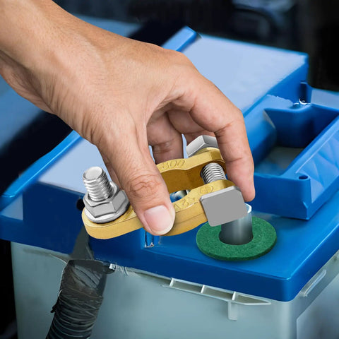 Hand installing Two Pair Battery Terminal Connectors With M8 Bolts 21mm Long, Pure Copper Cable Ends With Anti Corrosion Pad on a battery