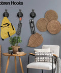 Industrial Pipe Wall Hooks Set Of 2 For Bathroom And Coat Rack, holding yellow backpack and umbrella, rustic decor setting.