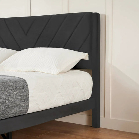 Queen Size Platform Bed Frame With Velvet Headboard And Wing Edge Design Crafted From Solid Wooden Slats For Legit Noise Free Rest No Box Spring Needed Straight Up Easy Assembly Matte Black Finish, close-up of velvet headboard.