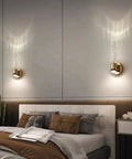 Modern LED Crystal Wall Sconces Bring A Hella Soft Up And Down Glow Perfect For Bedside Reading Or Living Room Vibes Quick Snap Install Solid Construction In A Snazzy Two Pack Vanity Lighting Set For Home Decor, installed in a stylish bedroom setting.