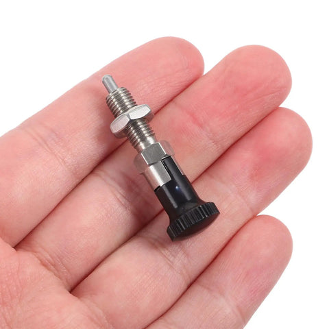 Stainless Steel Retractable Spring Plunger Knurled Grip Indexing Pin in hand, showcasing precision for shop modifications.