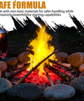 60 Pack Waterproof Fire Starters For Camping And Emergency Use In Fire Pits And Grills Non Toxic Long Lasting Burn For Five Minutes Or More, shown igniting a fire pit safely amid rocks.