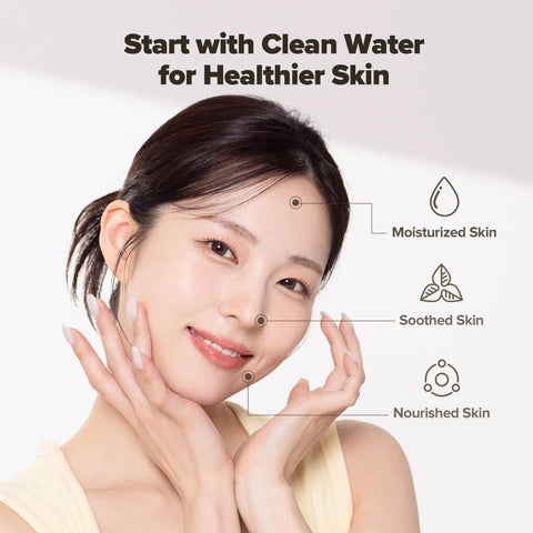 Smiling woman with moisturized, soothed, nourished skin using Bathroom Sink Faucet Water Filter With Vitamin C Gel Stops Chlorine And Heavy Metals NSF Certified Softens Hard Water For Sensitive Skin Made In Korea Pure White.