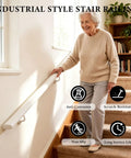 Heavy Duty Wrought Iron Stair Handrail Indoor Outdoor Rust Resistant Custom Length Grab Rail Built Tough With Heavy Gauge Steel Secure Step Railing For Home And Business Use, shown with senior user on stairs.