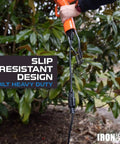 Heavy Duty Outdoor Extension Cord 12 Gauge 10 Ft With Lighted End in use outdoors, slip resistant plug for farm and workshop use.