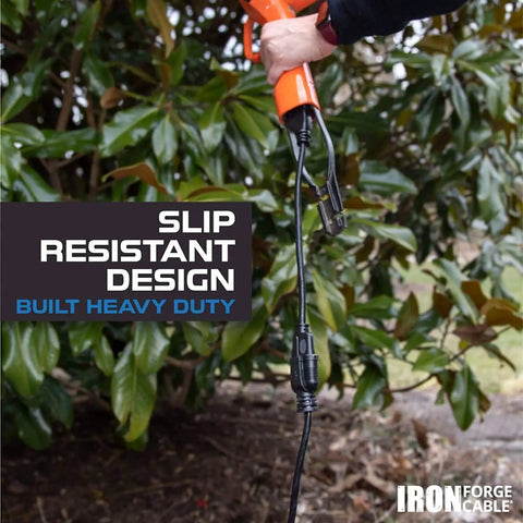 Heavy Duty Outdoor Extension Cord 12 Gauge 10 Ft With Lighted End in use outdoors, slip resistant plug for farm and workshop use.