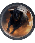 Illustration of a black bull charging, enclosed in a round frame with a fiery background.