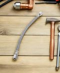 Heavy Duty Beefed Up Air Compressor Replacement Hose Kit With Stainless Steel And Aluminum Tubes on wooden surface