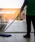 Badass Heavy Duty Dust Mop Kit With Telescopic Handle Twisted Closed Loop Head Killer Dust Pickup Smooth Glide For Pro Commercial Floor Cleaning in use on tile floor.