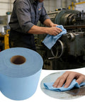 Person using Heavy Duty Blue Towels Jumbo Roll With 500 Industrial Strength Wipes for garage cleanup and machine maintenance.