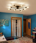8 Light Matte Black Semi Flush Mount Ceiling Fixture With Dope Vintage Industrial Farmhouse Vibe installed in living room