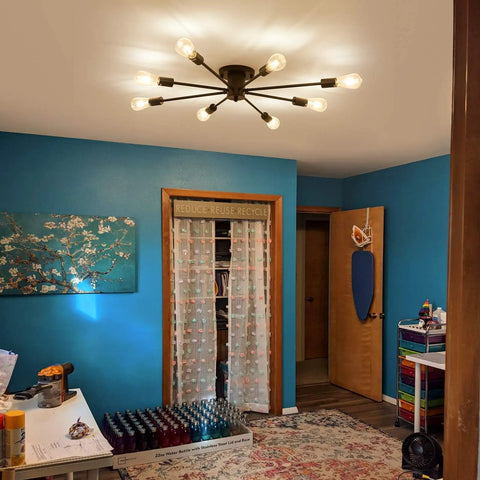8 Light Matte Black Semi Flush Mount Ceiling Fixture With Dope Vintage Industrial Farmhouse Vibe installed in living room