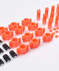 Bowfishing Arrow Safety Slide Kit 5/16 Inch ID Pack Of 12 with orange slides, black bushings, and silver stop screws displayed.
