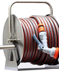 Heavy Duty Stainless Steel Garden Hose Reel Smooth Operator Wall Mount Rack For Patio with retractable hose and nozzle.