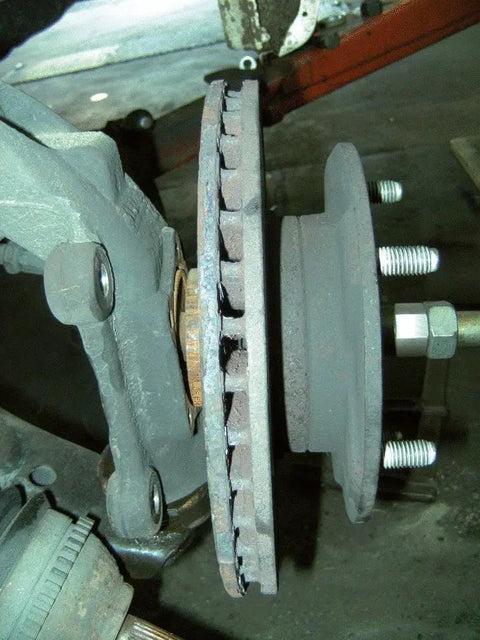 Ford Transit Brake Disc Puller Set For Van Maintenance showing a rotor setup with caliper and bolts