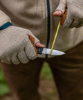 Person using Six Point One Inch Lightweight EDC Folding Knife With Stainless Steel Blade USA Made Lock Back for outdoor task