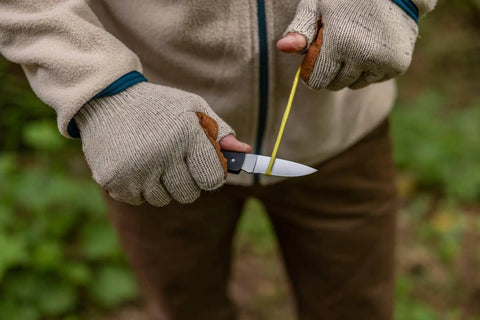 Person using Six Point One Inch Lightweight EDC Folding Knife With Stainless Steel Blade USA Made Lock Back for outdoor task
