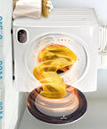 All In One Electric Washer Dryer Combo Smooth Operator Featuring Thick Stainless Drum Effortless Wash To Dry Cycling Stable Action Compact Fit For Everyday Laundry Grind, showing drying process with yellow fabric.