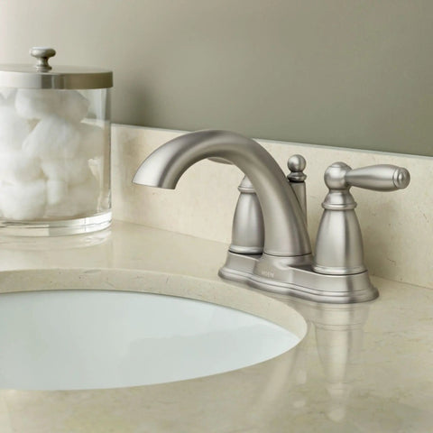 Brantford Brushed Nickel Two Handle Low Arc Traditional Centerset Bathroom Faucet With Drain Assembly on marble countertop