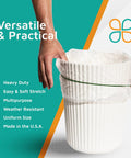 Dark Green Rubber Bands Size 33 3 1/2 In By 1/8 In 100 Pack securing trash bag on white bin