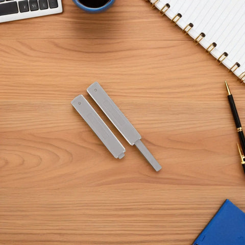 Push To Open Cabinet Latch Kit For Doors And Drawers, Invisible Lock on a wooden desk with notebook and pen