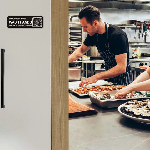 Premium Self Adhesive Must Wash Hands Sign 9 By 3 Inch Durable Acrylic Hand Washing Sign visible in restaurant kitchen
