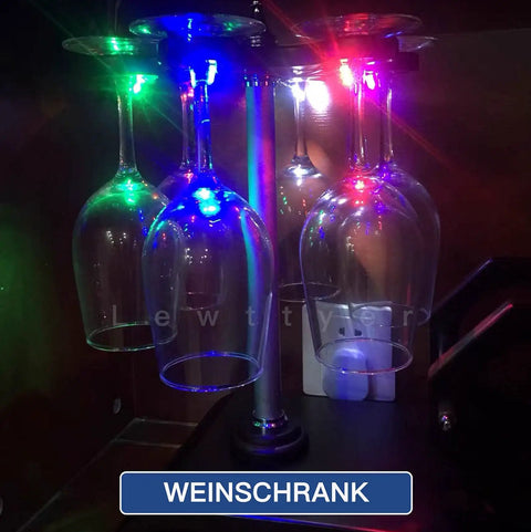 Illuminated wine glasses with 12V pre-wired 5mm LED diodes in multiple colors, perfect for model railroading and DIY lighting kits.