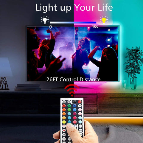 25 Foot RGB LED Strip Lights Kit With 44 Key Remote And 12V Power Supply Color Changing Vibe Lighting illuminating a TV setup