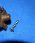 Old School Vintage Fleur De Lis Cabinet Knobs Set, Cast Iron Victorian Style Hardware with screw on blue background