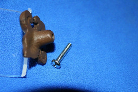 Old School Vintage Fleur De Lis Cabinet Knobs Set, Cast Iron Victorian Style Hardware with screw on blue background