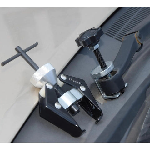 Beefed Up Dual Purpose Wiper Arm Puller Tool For Cars And Windshields, wiper arm remover and battery terminal puller on car surface.