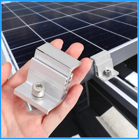 Person holding a clamp from 10 Piece Solar Panel End Clamps Set With Z Brackets For PV Mounting System Aluminum Rail Clips.
