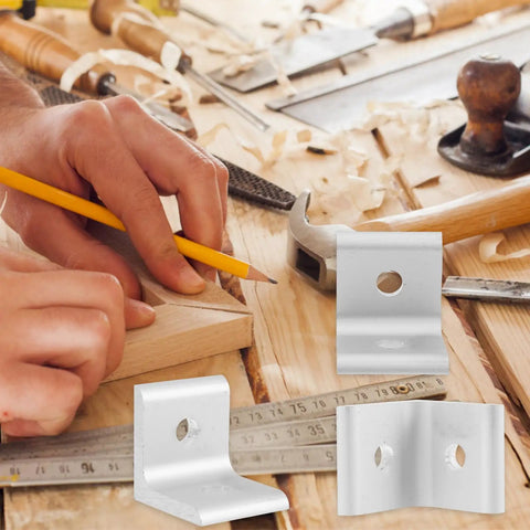 Top Shelf Aluminum Extrusion Corner Braces And L Bracket Connectors on a workbench; perfect for 3D Printers, CNC Routers, Robotics.