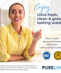 Smiling woman holding glass of water in kitchen, promoting Replacement Water Filter Cartridges For Brita Pitchers And Dispensers No-Brainer.