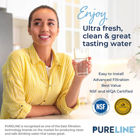 Smiling woman holding glass of water in kitchen, promoting Replacement Water Filter Cartridges For Brita Pitchers And Dispensers No-Brainer.