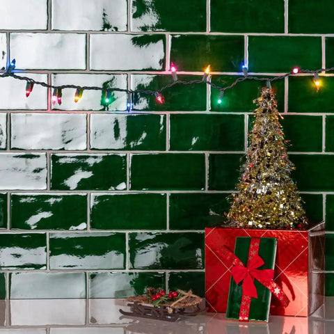 Viva Antic Verde 3x6 Ceramic Wall Tile With Dope Glazed High Sheen Finish in a decorative Christmas scene with lights