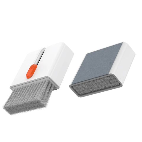 Amazon camera cleaning kit; white two-piece set with orange-button brush and gray foam pad