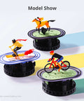 3D printed models of a horse racer, surfer, and cyclist on display, showcasing detailed figurines on circular bases.