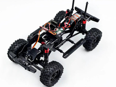 Built Different 1/18 Scale Brushless Rc Truck Crawler Rtr showcasing the chassis with steel core gears and portal axles.